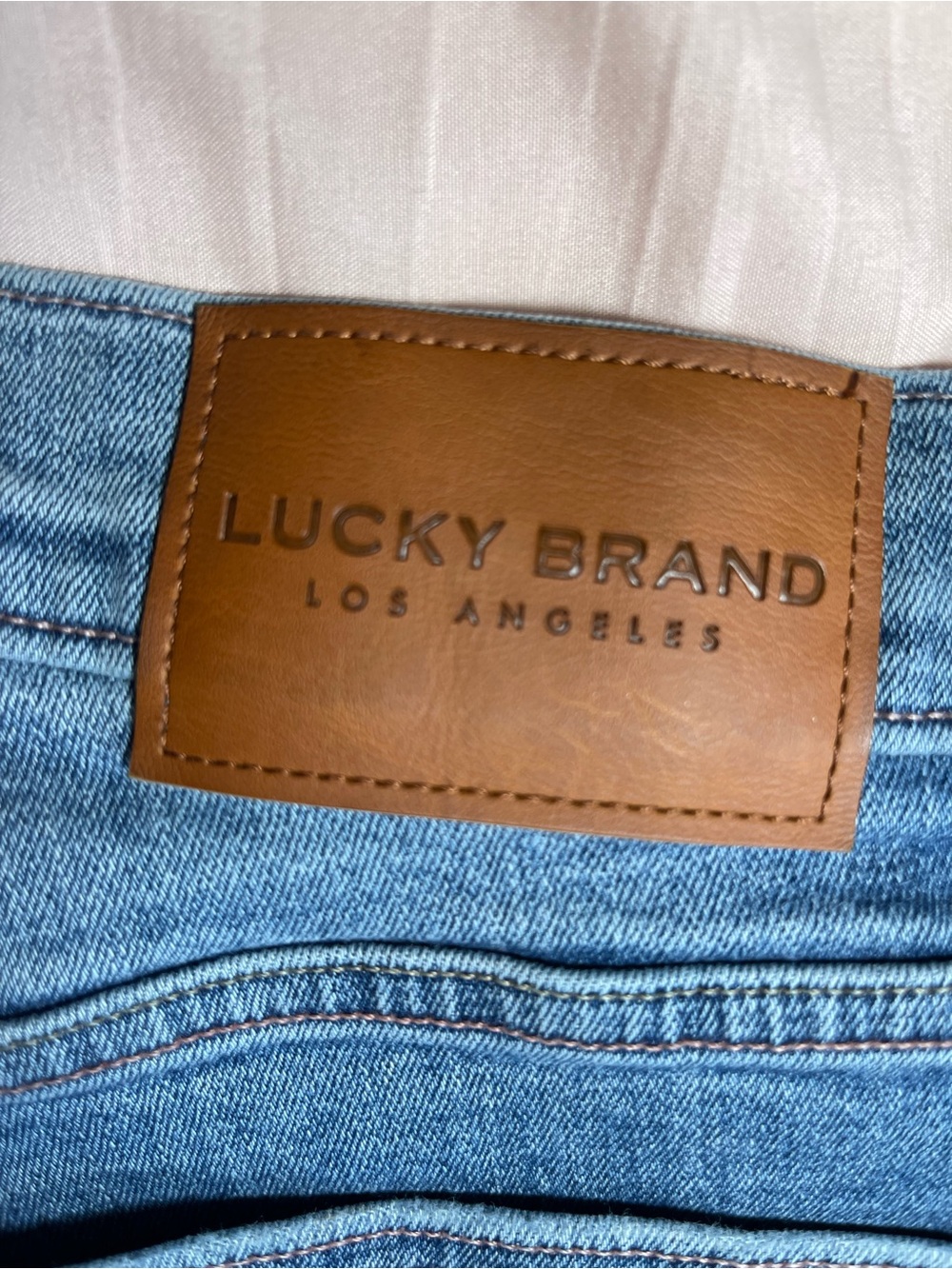 Lucky Brand Women’s Light Blue Denim Jeans with Brown Leather Patch